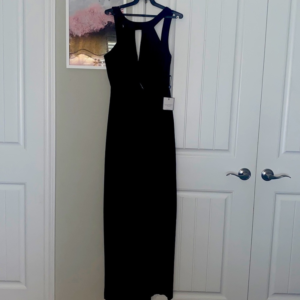Black dress with open back. Size: 2